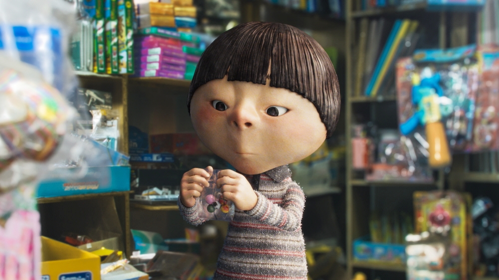 写真は、アニメ『あめだま』のワンシーン。主人公のドンドンが文房具店であめだまを買う様子＝ロッテカルチャーワークス